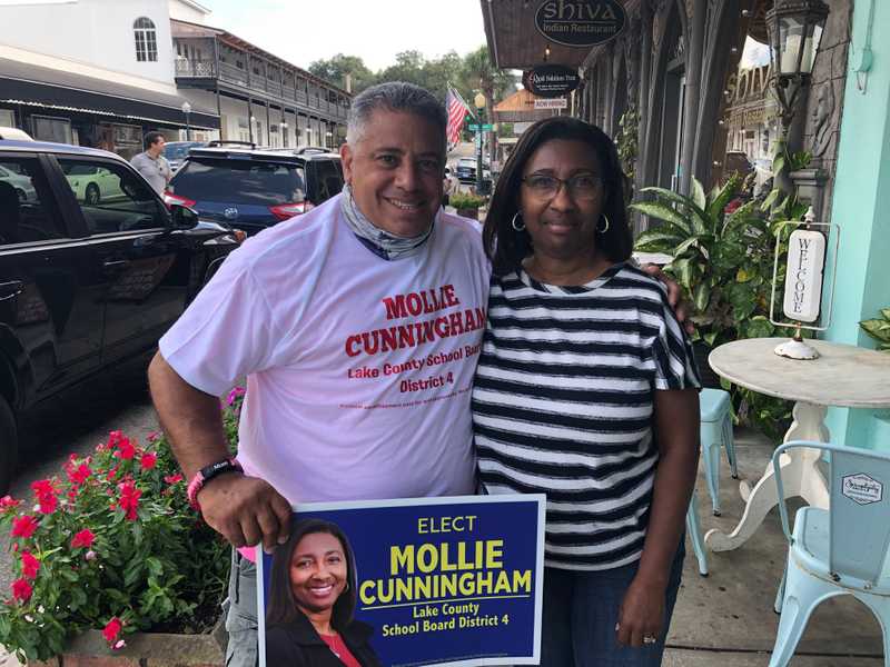 Michael Garcia, former Lake County School Board District 4 candidate, wearing a Mollie Cunningham for Lake County School Board shirt and standing next to Mollie Cunningham